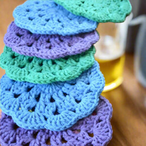 Handmade Crochet Coasters Set with Matching Basket – Round Wool Drink Mats (Set of 6)
