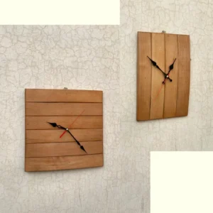 simple wooden clock - Artoza Crafts | Where Craft Becomes Style Two wooden square wall clocks with black hands and red second hands mounted on a cracked light wall.