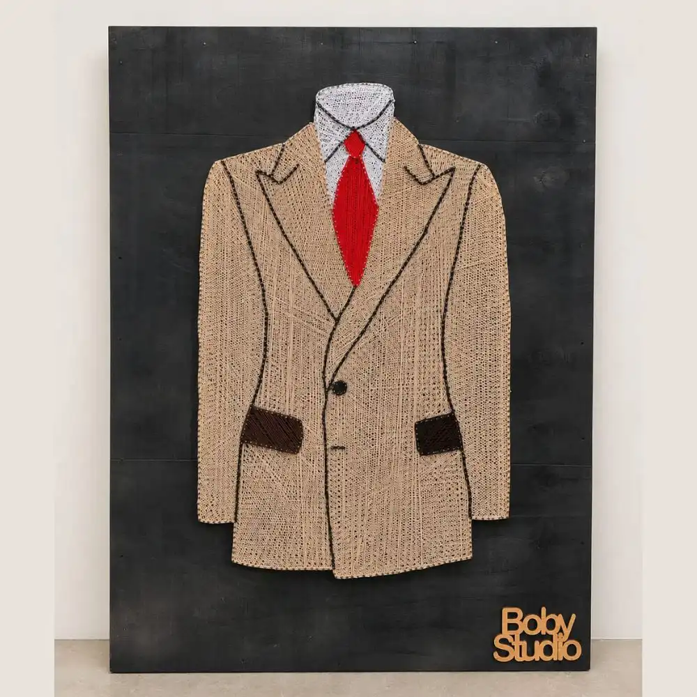 thread string art - Artoza Crafts | Where Craft Becomes Style Abstract textile portrait of a beige blazer with a red tie on a dark panel, signed 'Baby Studio' in the corner.