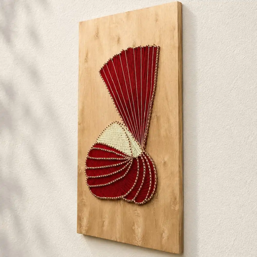 turban nail art - Artoza Crafts | Where Craft Becomes Style Decorative wall art: red string forming a seashell on a wooden panel on the wall.
