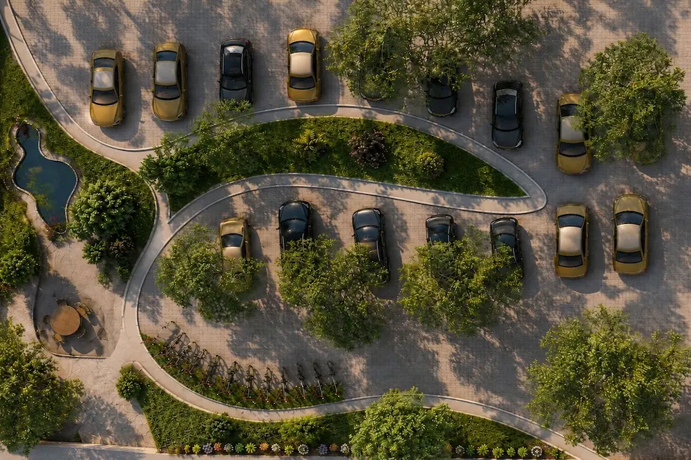 Design Development Diagram - Artoza Crafts | Where Craft Becomes Style Aerial view of a winding driveway with parked cars and landscaped greenery between sections of pavement and trees.